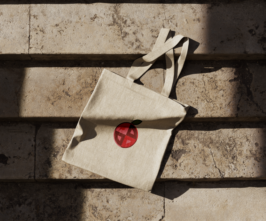 Canvas tote bag printed with the illustrated guava mark