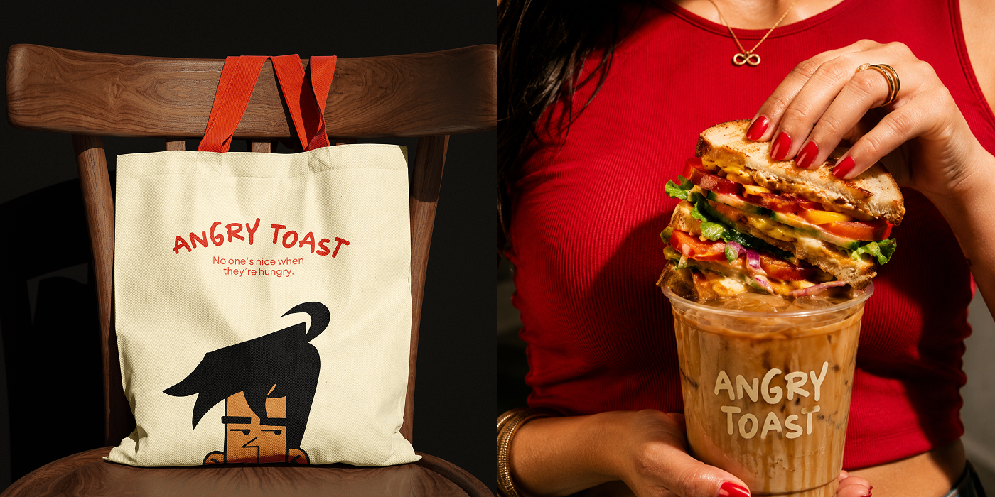 Angry Toast tote on a chair beside a stacked sandwich resting on an iced coffee